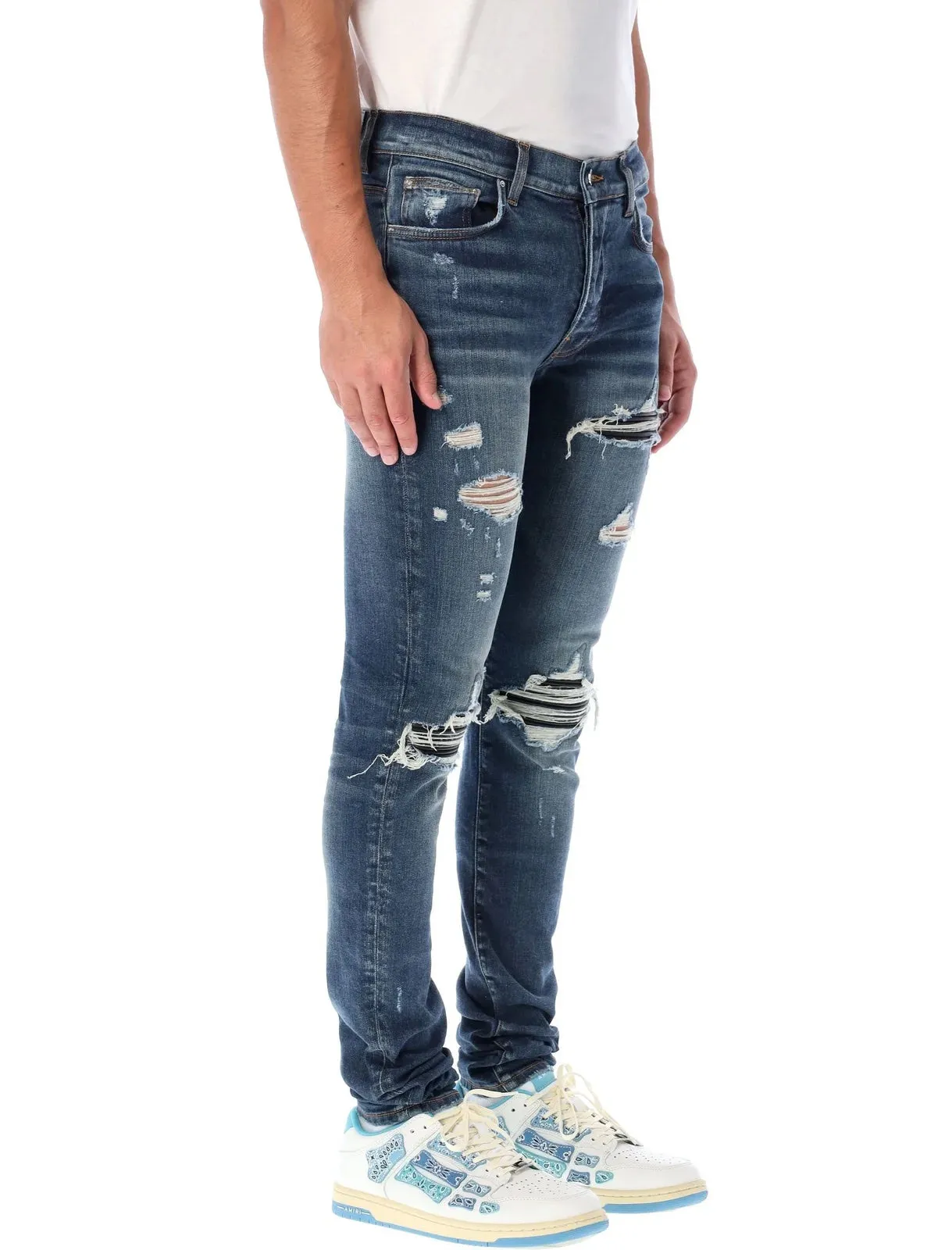 AMIRI MX1 DISTRESSED SKINNY LEG JEANS