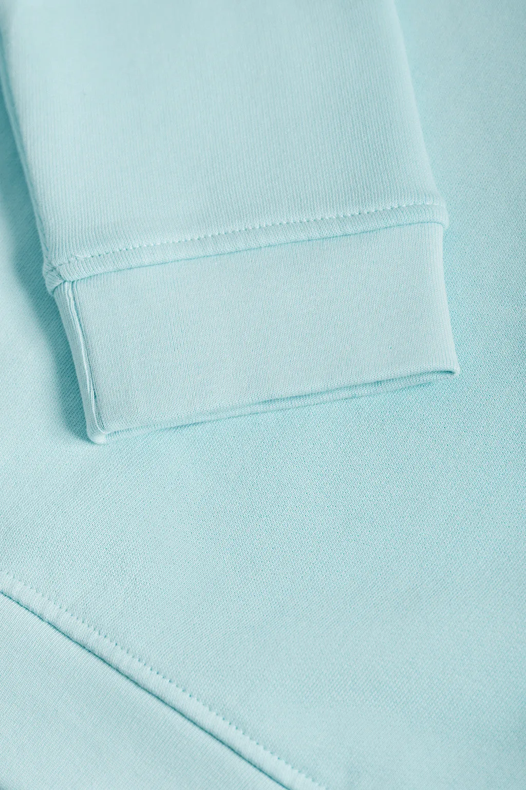 Sudadera básica azul celeste de cuello redondo y logo Rigby Go